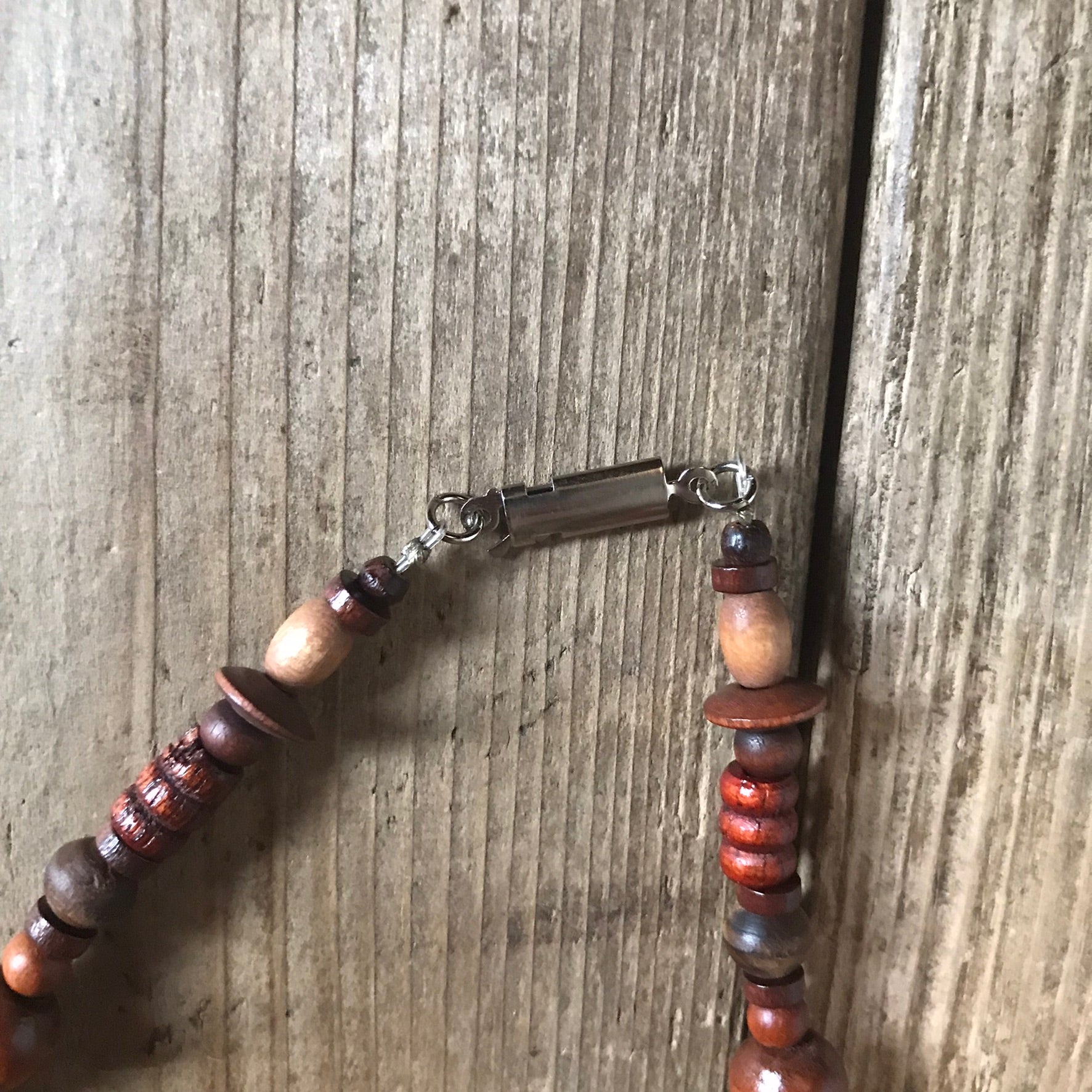 DARK WOOD BEAD SHORT NECKLACE CLOSE UP OF FISH HOOK CLASP